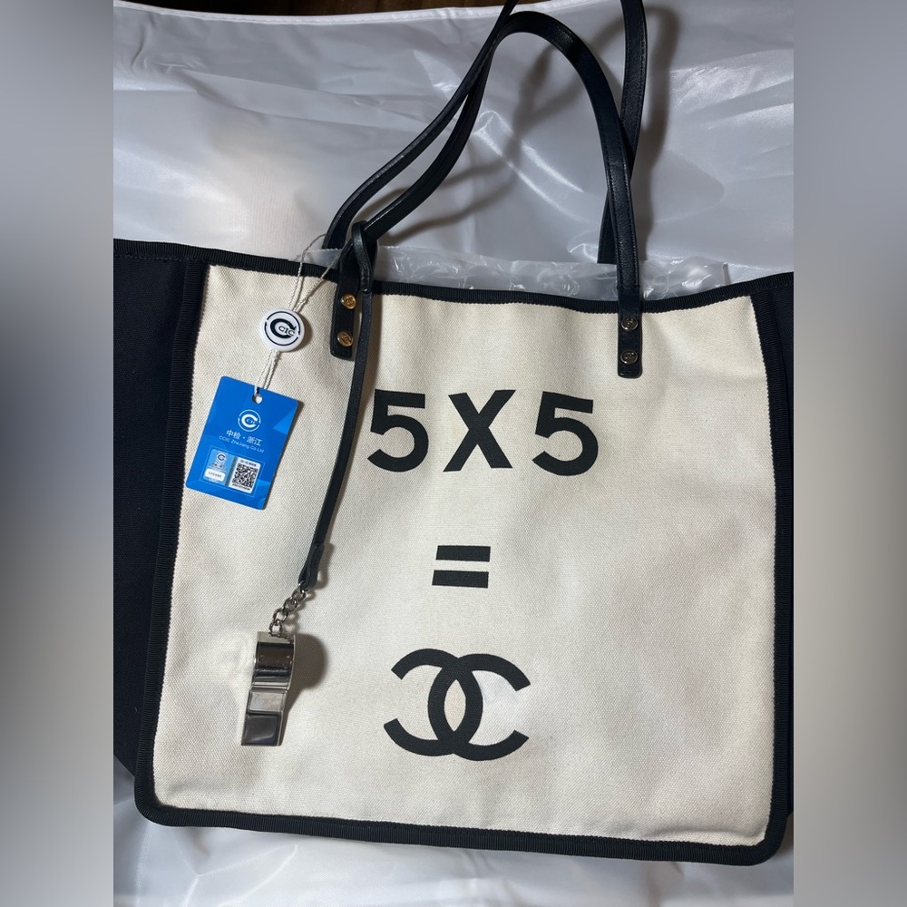 Authentic Chanel pre-owned 2014 CC 5x5 canvas tote handbag